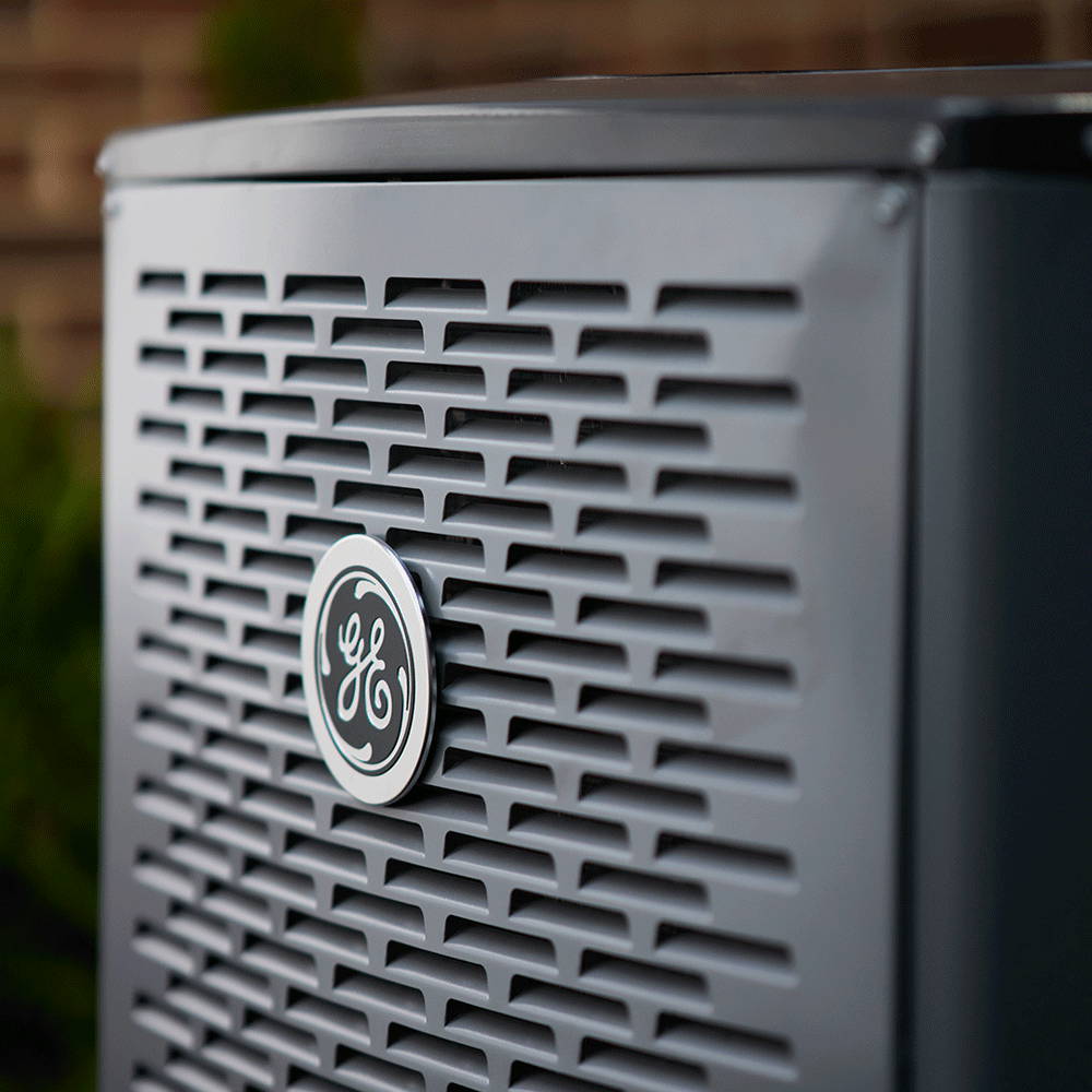 Close-up of GE HVAC condenser cabinet and grille